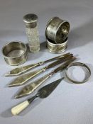 Collection of hallmarked silver items to include napkin rings, silver lidded scent bottle, baptismal