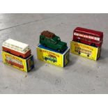 Three boxed Matchbox Series diecast model vehicles: 12 Safari Land Rover, 74 Damiler Bus, 68