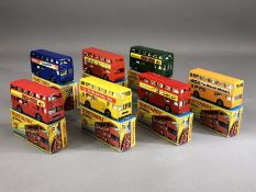 Seven boxed Matchbox no 17 'The Londoner' diecast model buses: Fruit Gums x 2, Its the Real Thing