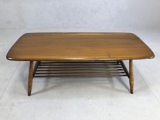 Ercol 'Golden Dawn' coffee table with shelf under on turned legs, approx 104cm x 46cm x 37cm tall