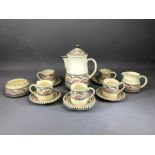 Honiton Ware part coffee set comprising coffee pot with lid, cream jug, sugar bowl, five cups and