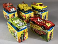 Five boxed Matchbox Superfast diecast model vehicles: 16 Badger, 28 Stoat, 57 Wild Life Truck, 67