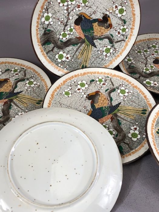 Collection of six Oriental stoneware plates decorated with birds on a branch, surrounded by flowers, - Image 4 of 4