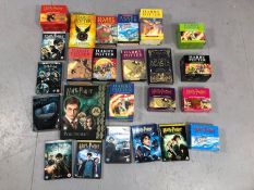 HARRY POTTER: Collection of Harry Potter DVDs, audio books, books (some first edition),