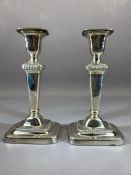 Pair of silver plated candlesticks approx 21cm tall