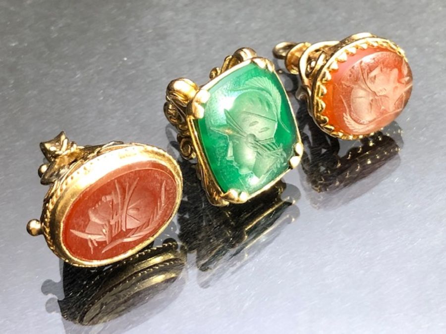 TWO 9ct Gold hallmarked OVAL CARNELIAN SEAL FOBS, with intaglio detailing, and a third square