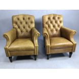 Pair of leather / cattle hide tan fireside button back chairs, by Laura Ashley
