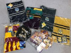 HARRY POTTER: Merchandise to include Harry Potter scarfs, Dumbeldore hat, Magic Reveal pin badges,