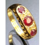 Antique 18ct Gold Ruby and Diamond ring, three Rubies and four diamonds in a pierced setting size '