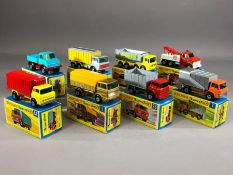 Eight boxed Matchbox Superfast diecast model vehicles: 1 Mercedes Truck, 7 Ford Refuse Truck, 26 GMC
