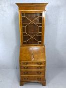 Modern burr walnut-effect bureau bookcase with key, four drawers, two shelves, glazed door, approx