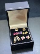 six sets of Gold & gold coloured earrings all set with gemstones