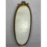 Oval gilt framed mirror, approx 120cm x 37cm