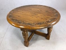 Circular wooden coffee table, approx 76cm in diameter