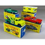 Four boxed Matchbox Series diecast model vehicles: 13 Dodge Wreck Truck, 22 Pontiac G.P. Coupe, 23