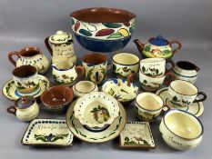 Large collection of Devon Ware including Torquay and Watcombe, including 'Motto', circa 25 pieces