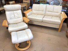Light wood framed two seater sofa with matching reclining armchair and footstool, sofa approx