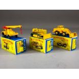 Three boxed Matchbox Series diecast model vehicles: 11 Jumbo Crane, 18 Caterpillar Bulldozer, 69