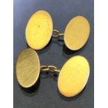 Pair of 18ct Gold oval plain cufflinks, approx 7.8g
