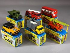 Six boxed Matchbox Superfast diecast model vehicles: 18 Field Car, 28 Mack Dump Truck, 35 Merry