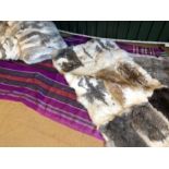 Modern Interiors: Collection of two fur-style throws and matching cushions