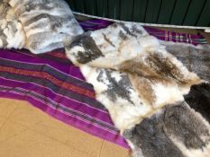 Modern Interiors: Collection of two fur-style throws and matching cushions