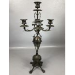 Neo-classical Silver coloured metal candelabra on clawed feet with central ovoid section with