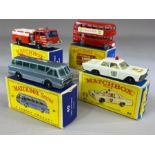 Four boxed Matchbox Series diecast model vehicles: 5 Routemaster, 29 Fire Pump Truck, 40 Long