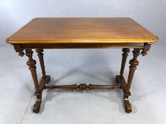 Occasional table on turned legs and stretcher, on scroll feet, with drawers to each long side,
