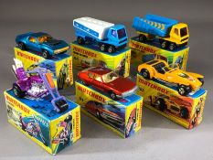 Six boxed Matchbox Superfast diecast model vehicles: 9 AMX Javelin, 38 Stingeroo, 50 Articulated