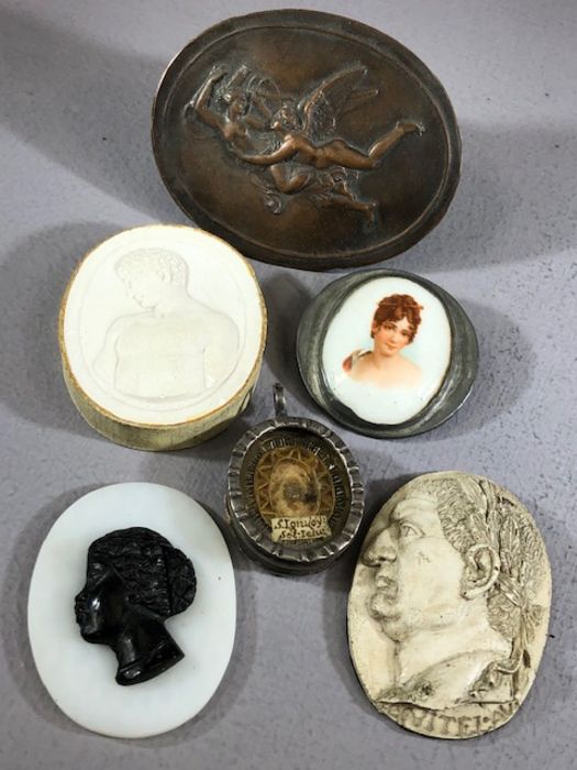 Collection of cameos depicting Cupid and Psyche, Antinous, Caesar, etc along with an interesting