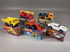 Five boxed Matchbox Superfast diecast model vehicles: 8 De Tomaso Pantera, 26 Cable Truck, 29