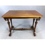 Occasional table on turned legs and stretcher, on scroll feet, with drawers to each long side,