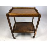 Vintage two tier tea trolley with detachable trays and folding frame