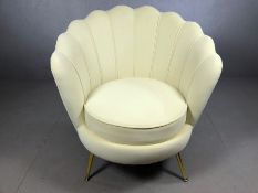 Cream clam shell design single upholstered chair on tapered legs