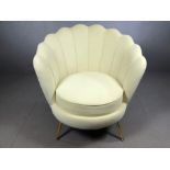 Cream clam shell design single upholstered chair on tapered legs