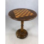 Circular games table, chess board, draughts board, wooden inlay, on turned pedestal and circular