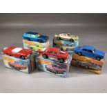 Five boxed Matchbox diecast model vehicles: 4 '57 Chevy, 16 Pontiac, Superfast 39 Rolls-Royce, 42 '