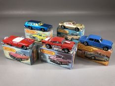 Five boxed Matchbox diecast model vehicles: 4 '57 Chevy, 16 Pontiac, Superfast 39 Rolls-Royce, 42 '