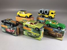 Five boxed Matchbox diecast model vehicles: Superfast 3 Porsche Turbo, Superfast 7 VW Golf, 26 Cable