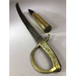 Militaria: Cutlass or sword with brass handle and a shell casing