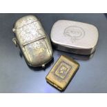 Unusual sovereign and vesta case combined with a brass stamp holder and silver coloured vesta/ snuff