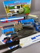 Collection of OO gauge model railway items: track, locomotives, carriages and accessories, to