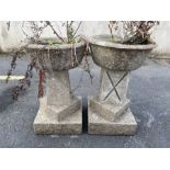 Two pedestal concrete garden planters, approx 58cm tall