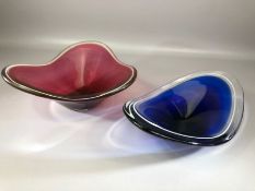 Two Paul Kedelv for Flygfors signed art glass bowls, one in blue approx 32cm in length, one in red