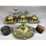 Collection of inkwells, four in brass with ceramic or glass wells, two glass, one pewter and one