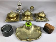 Collection of inkwells, four in brass with ceramic or glass wells, two glass, one pewter and one
