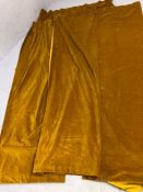 TEXTILES: Tow pairs of gold velvet curtains, each curtain approx 220cm in drop x 140cm in width,