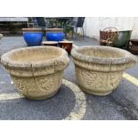 Pair of concrete garden planters, approx 30cm tall