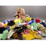 Vintage toys: Two Barbie dolls and a Sindy doll along with a collection of clothing and accessories